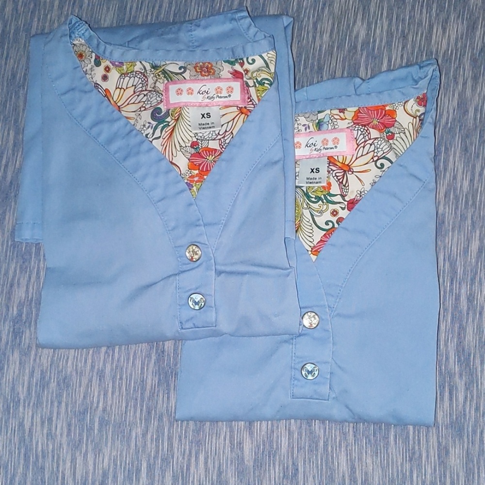 Lot of 2 ceil blue scrup tops